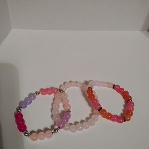 Handmade three piece cute colorful bright cool pink and purple bracelet set